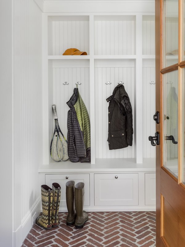 mudroom with brick floor© Jacob Lilley Architects Needham, MA
