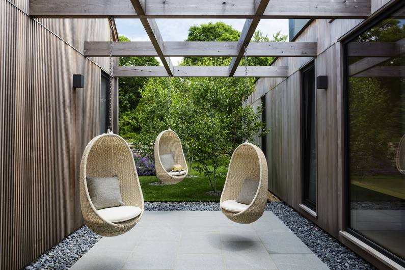outdoor trellis and views to roof deck Modern Martha’s Vineyard Vacation Home Becomes Primary Residence For This Family Of Five - © Jacob Lilley Architects, Wellesley, MA
