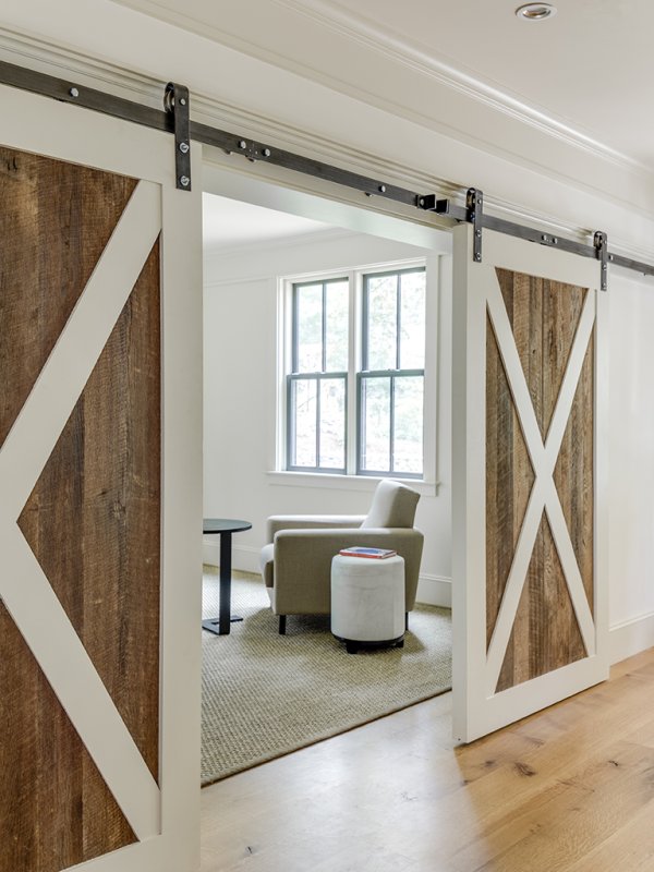 painted and natural wood barn doors© Jacob Lilley Architects Lexington, MA