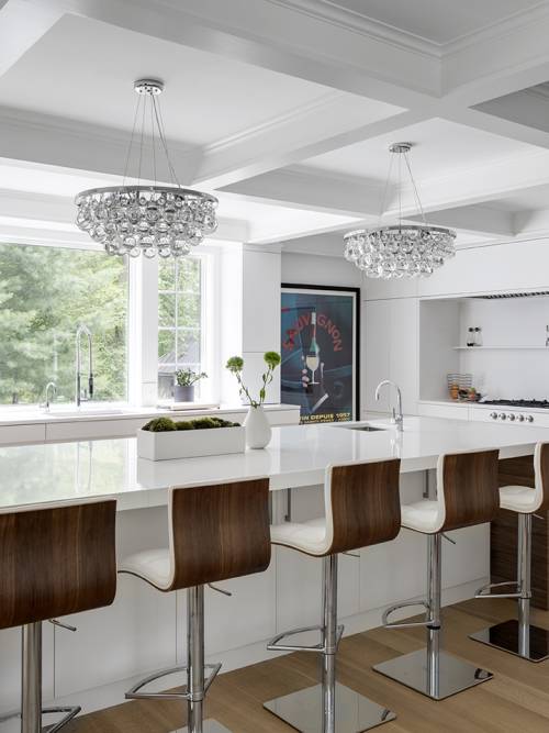 transitional kitchen with large island and pendants